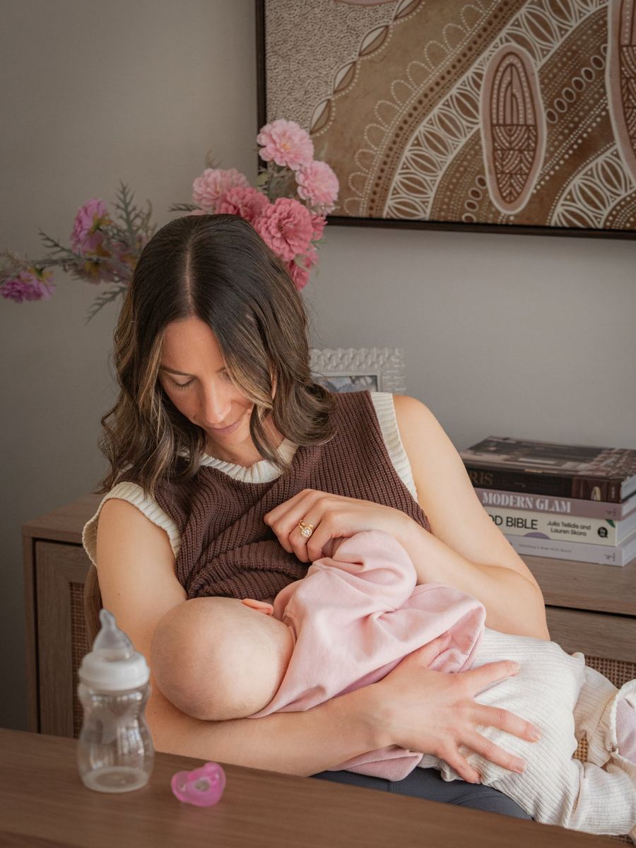 A mom breastfeeding her baby