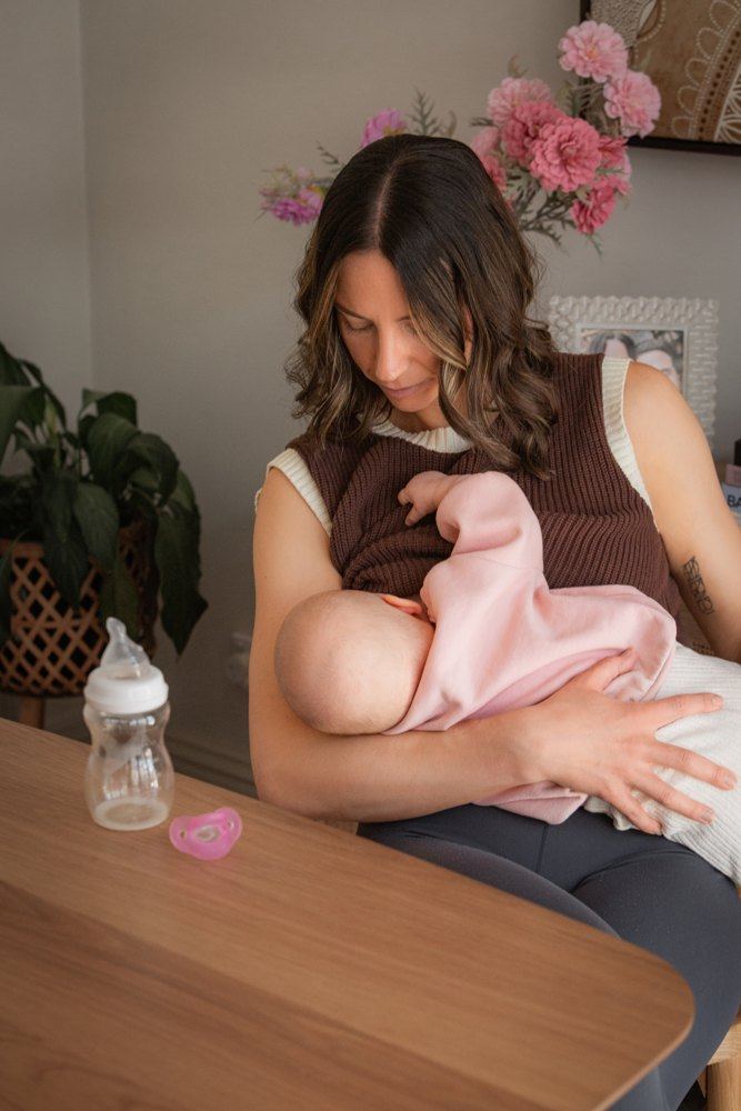 A mom breastfeeding her baby