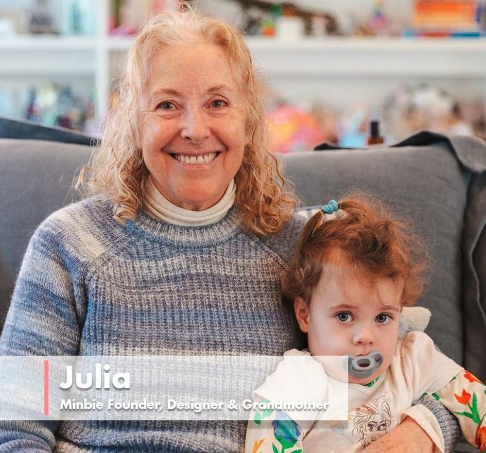 Julia, Minbie founder, designer and grandmother, with her granddaughter
